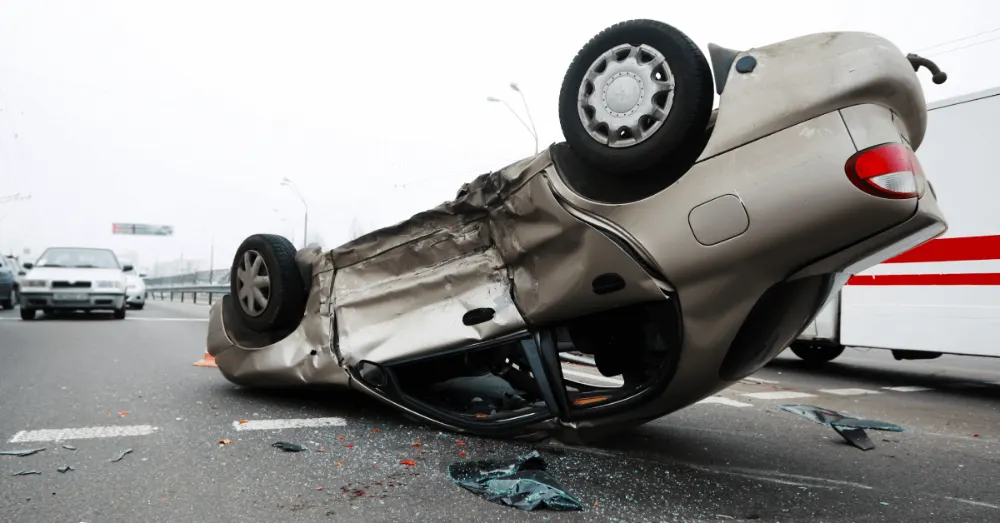 Overturned car in the road after a serious crash